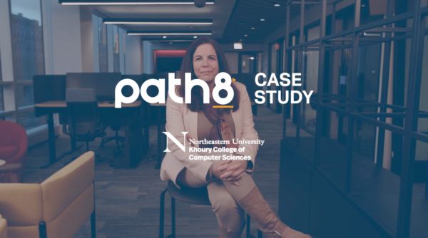 Professional woman seated in an office environment with overlay text relating to a path8 case study at northeastern university's khoury college of computer sciences.